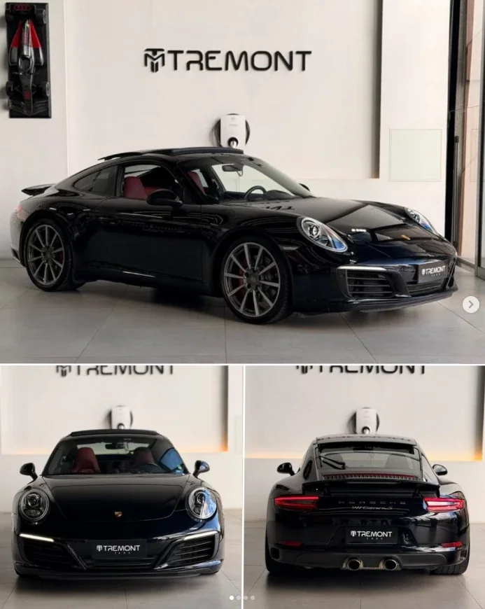Porsche 911 Carrera preto no showroom da Tremont Cars